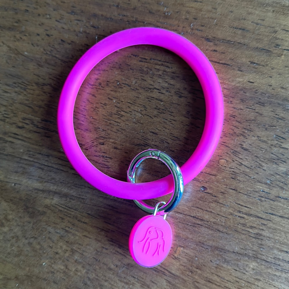Drunk Elephant pink wristlet rubber keychain
